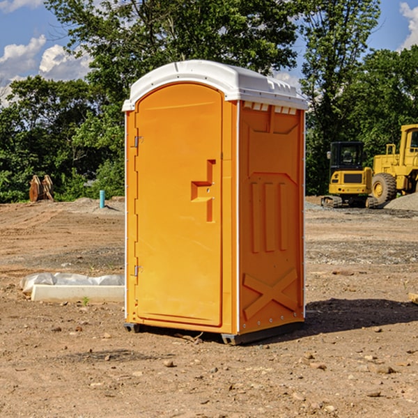 how often are the portable restrooms cleaned and serviced during a rental period in Elba